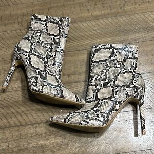 Express snake skin boots size 9